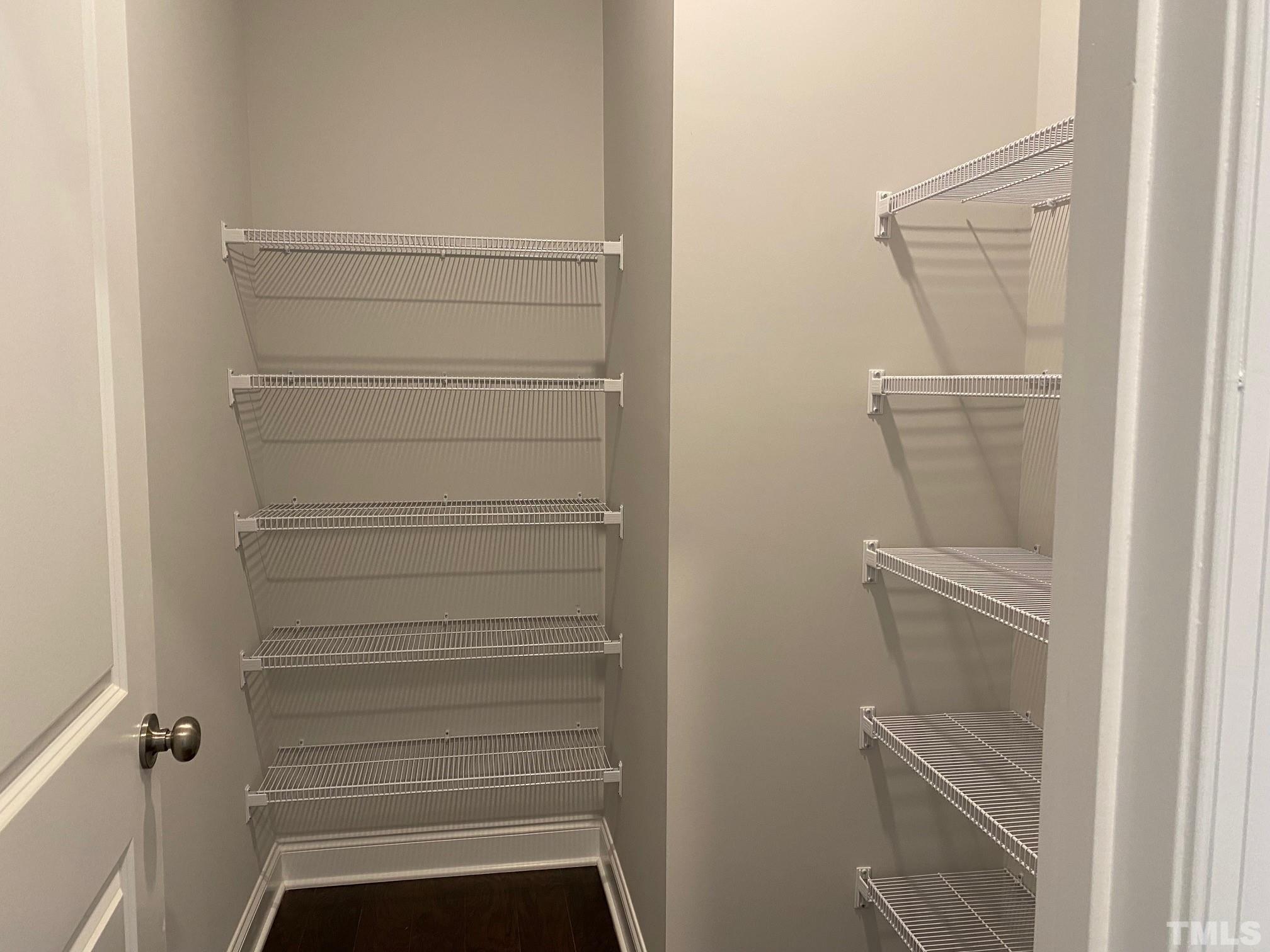 312 Ressler Street, Unit 504 Holly Springs, NC 27540 - Photo 8 of 30 a view of walk in closet