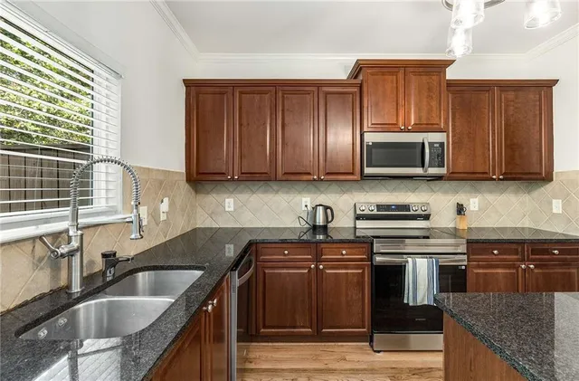 a view of backyard with deck