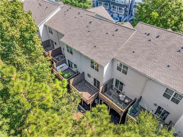 a bathroom with a sink a mirror and a shower
