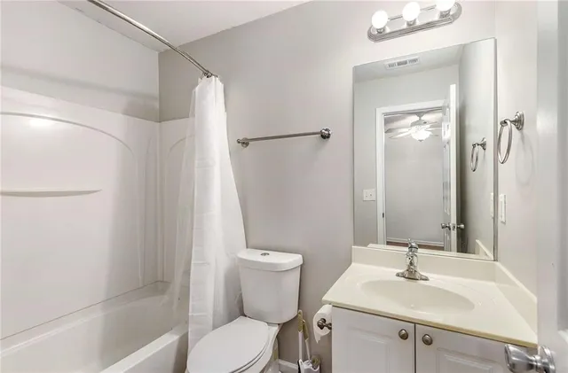 a front view of a house with a large window