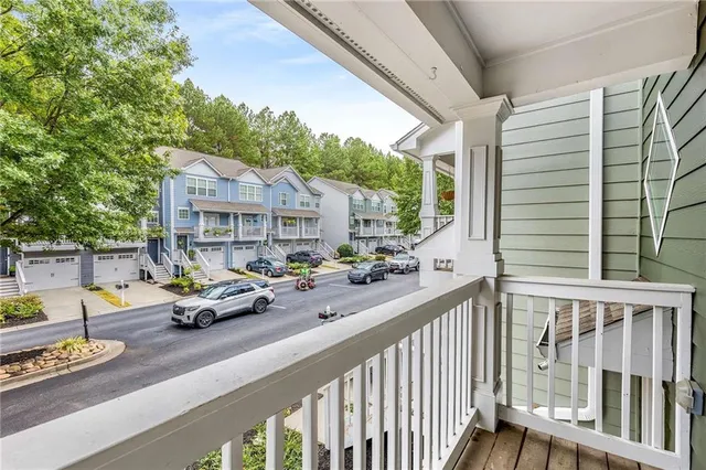 a view of a car park from a porch