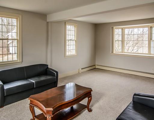 53 Burbank Road Sutton, MA 01590 - Photo 7 of 29 a living room with furniture and a window