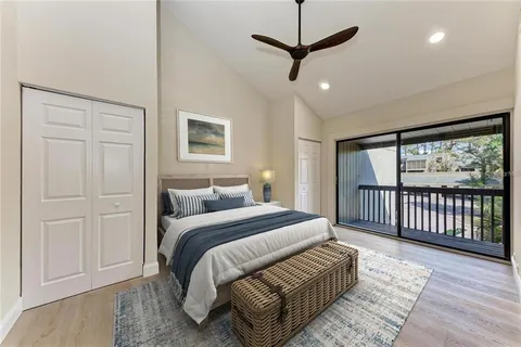 an aerial view of a house with a lake view