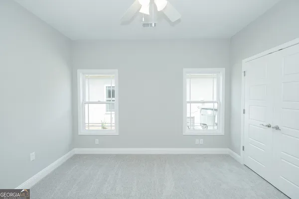 an empty room with windows