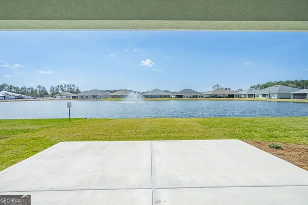 a view of a swimming pool and lake view