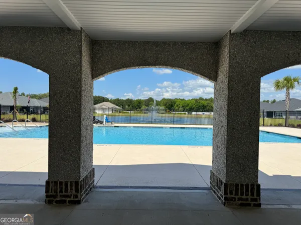 a view of swimming pool from a window
