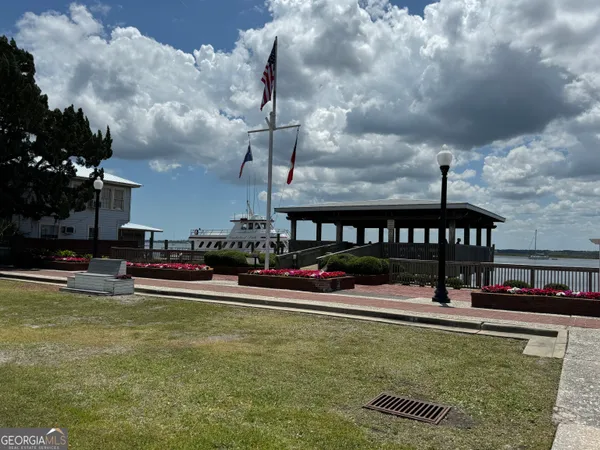 a view of a lake with sitting space