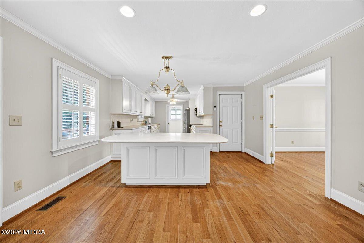 335 Hamrick Road Macon, GA 31220 - Photo 3 of 41 a view of kitchen with sink and wooden floor