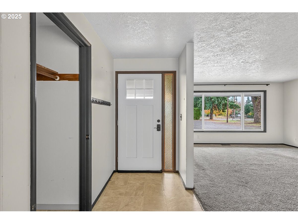 57827 South Bachelor Flat Road Warren, OR 97053 - Photo 16 of 38 a view of an empty room with a window