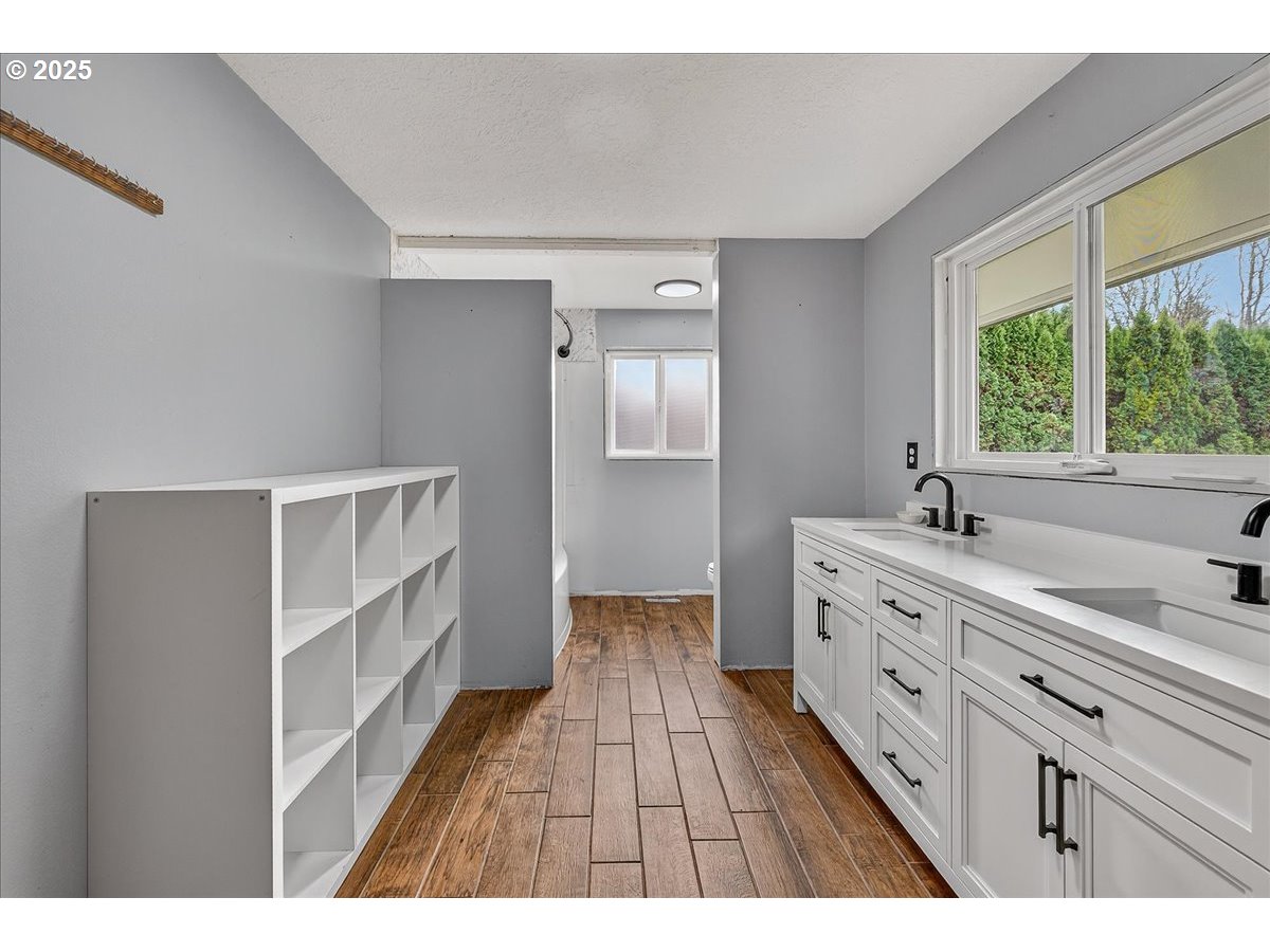 57827 South Bachelor Flat Road Warren, OR 97053 - Photo 26 of 38 a view of hallway with wooden floor and window