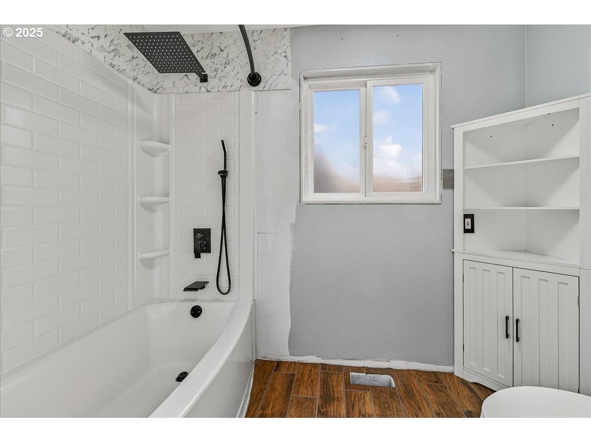 57827 South Bachelor Flat Road Warren, OR 97053 - Photo 27 of 38 a bathroom with a bathtub and a shower
