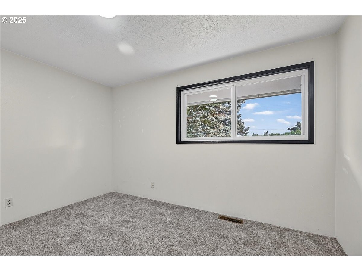 57827 South Bachelor Flat Road Warren, OR 97053 - Photo 34 of 38 a view of an empty room