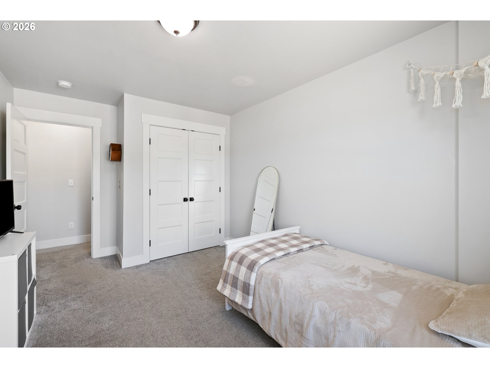 204 St Helens Way Winlock, WA 98596 - Photo 15 of 42 a bedroom with a bed and a view of bathroom