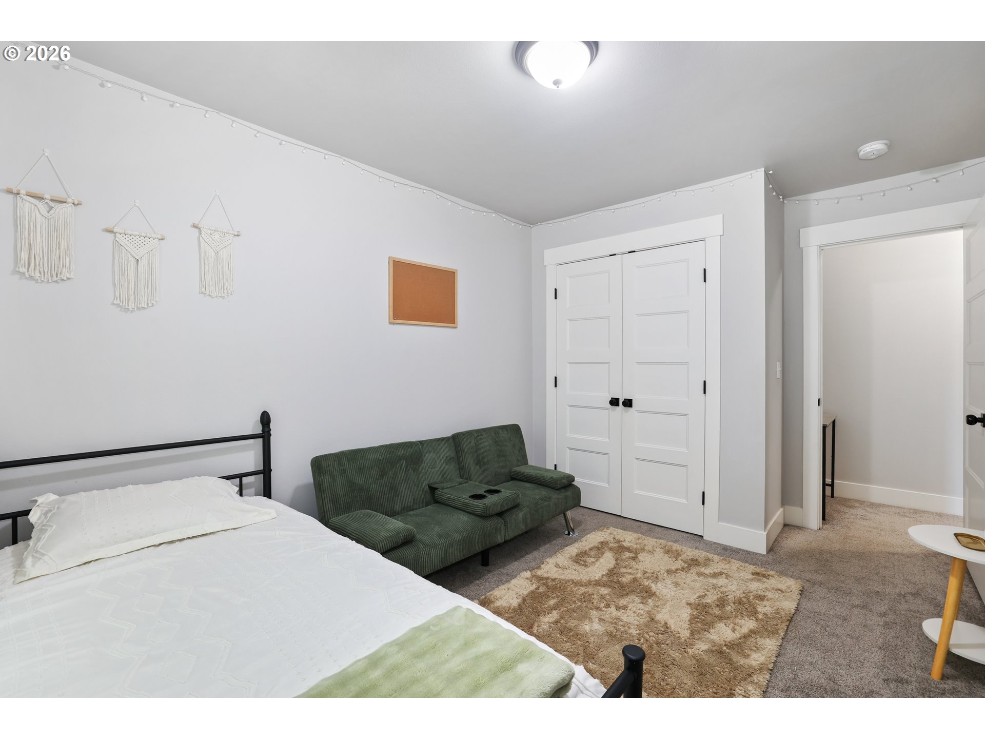 204 St Helens Way Winlock, WA 98596 - Photo 17 of 42 a bedroom with a bed and a view of bathroom