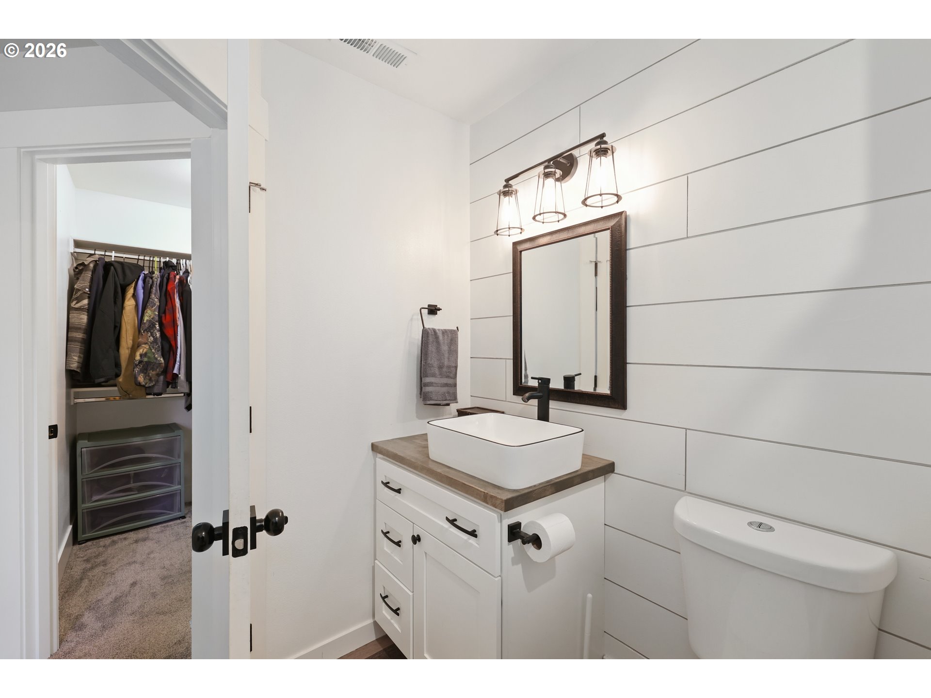 204 St Helens Way Winlock, WA 98596 - Photo 24 of 42 a bathroom with a sink and mirror