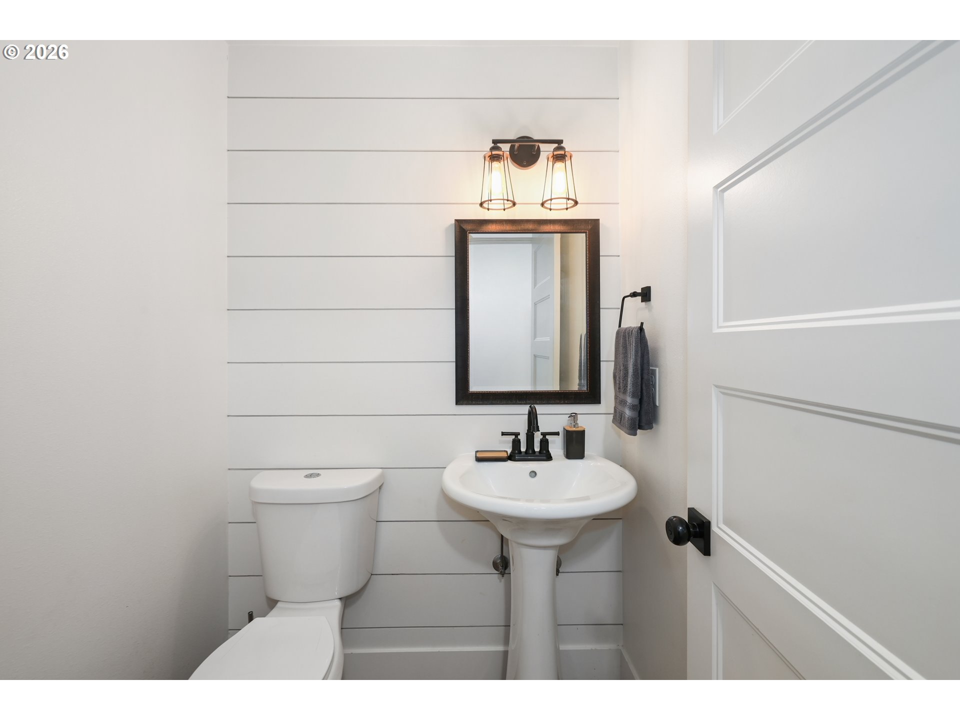 204 St Helens Way Winlock, WA 98596 - Photo 25 of 42 a bathroom with a sink toilet and mirror