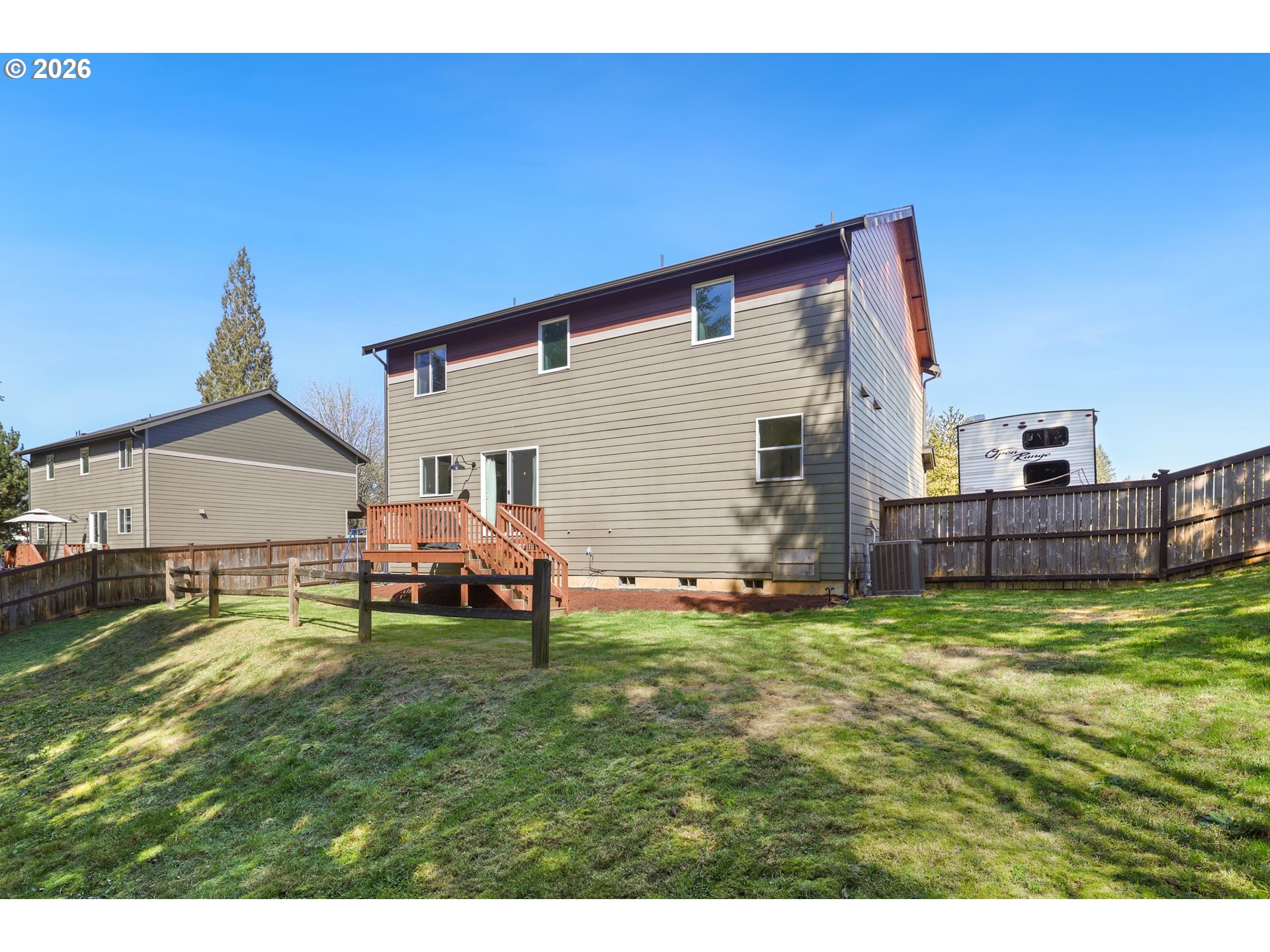 204 St Helens Way Winlock, WA 98596 - Photo 28 of 42 a backyard of a house with table and chairs