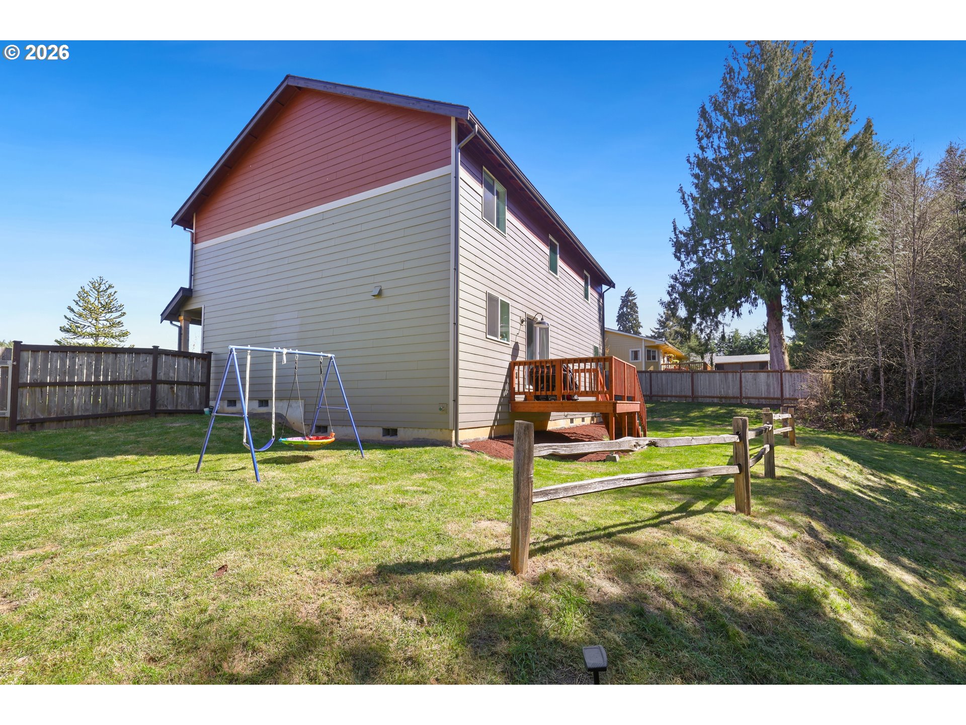 204 St Helens Way Winlock, WA 98596 - Photo 29 of 42 a view of a backyard with a small house and a swimming pool