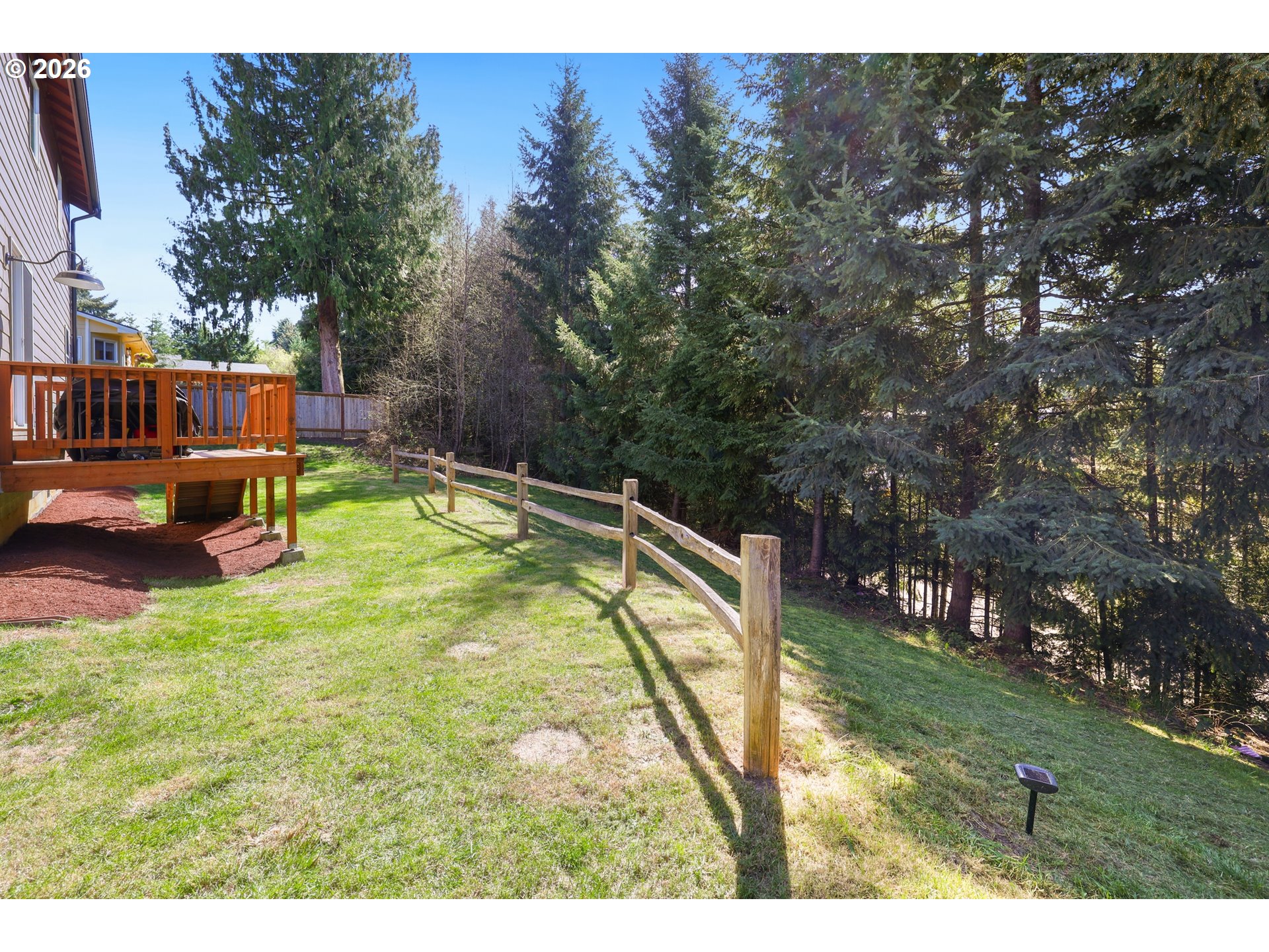 204 St Helens Way Winlock, WA 98596 - Photo 30 of 42 a view of a swimming pool with a yard