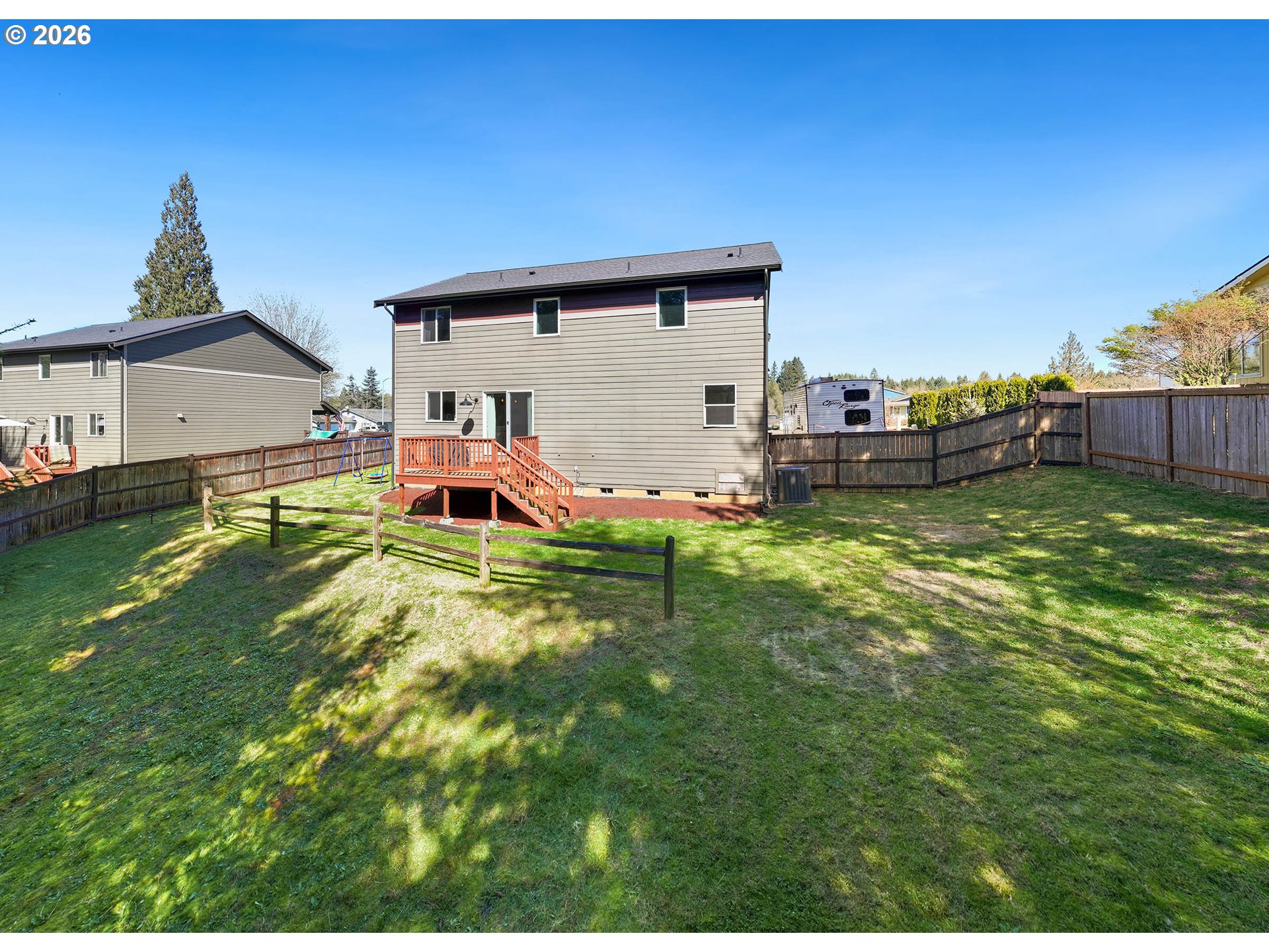 204 St Helens Way Winlock, WA 98596 - Photo 34 of 42 a view of a house with a yard and sitting area