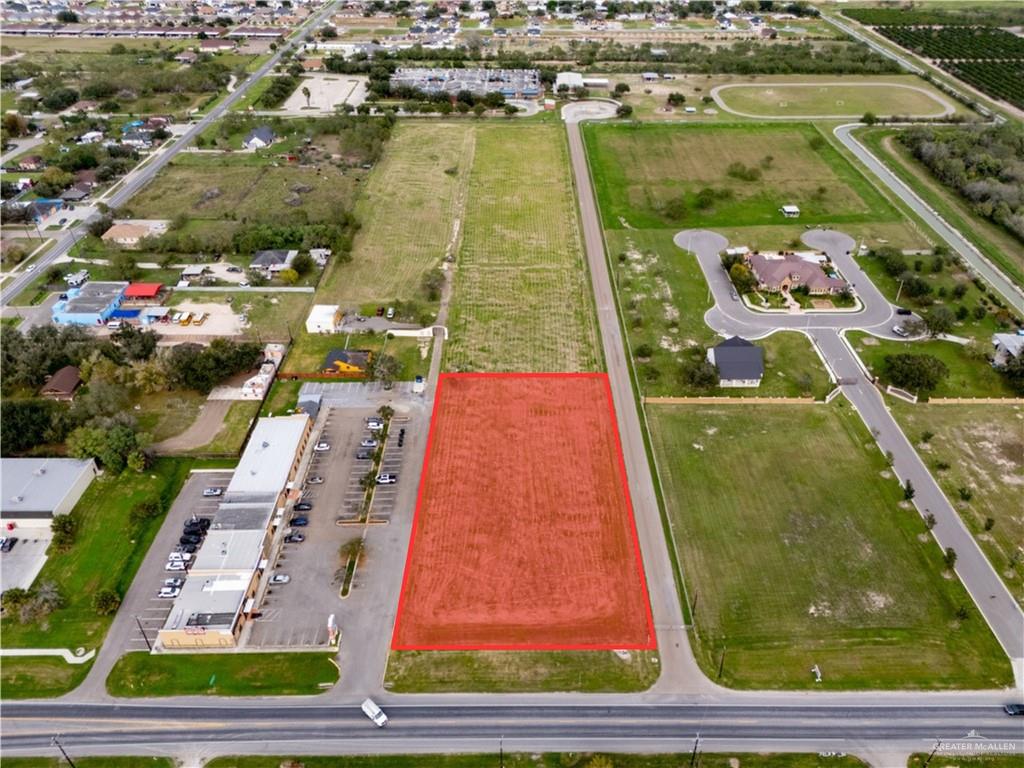 0 East Main Avenue Alton, TX 78573 - Photo 2 of 5 an aerial view of residential houses with outdoor space