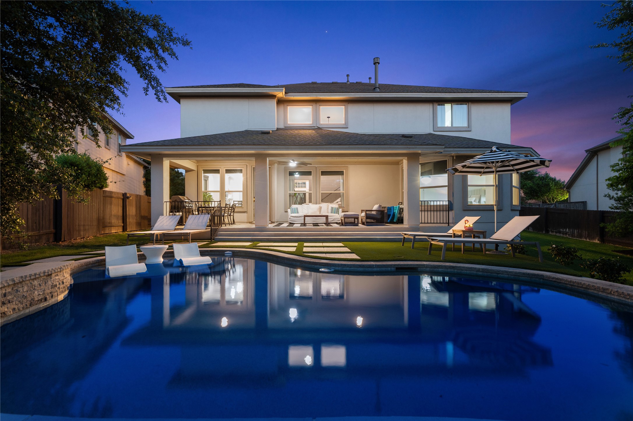 2829 Long Lasso Pass Leander, TX 78641 - Photo 2 of 40 a view of a house with pool and chairs