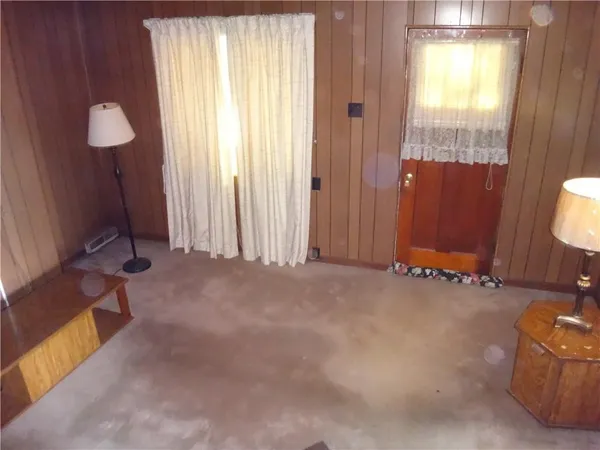 a view of a room with windows