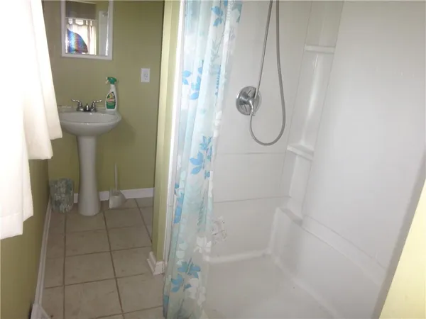 a bathroom with a bath tub