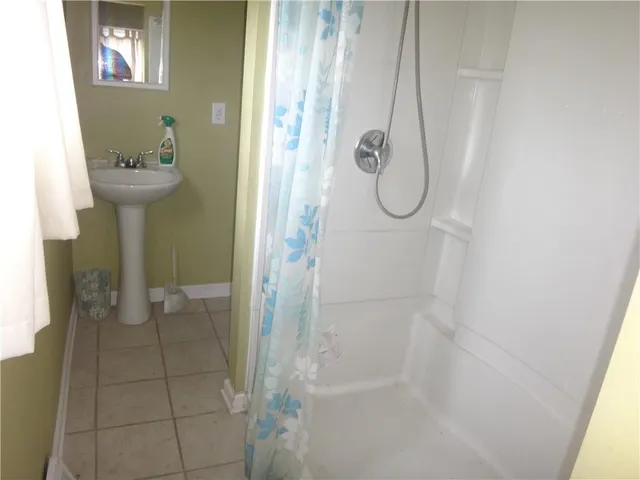 a bathroom with a bath tub