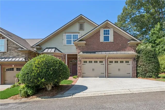 a view of a house with a garage