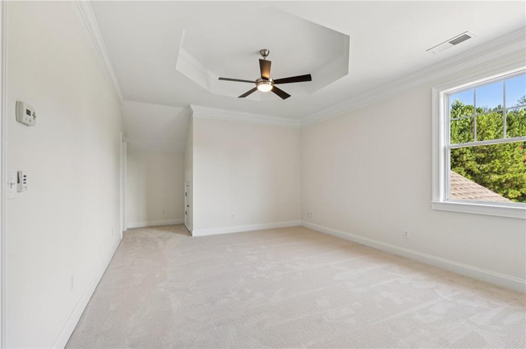 1950 Buford Dam Road, Unit 801 Cumming, GA 30041 - Photo 25 of 26 an empty room with a window
