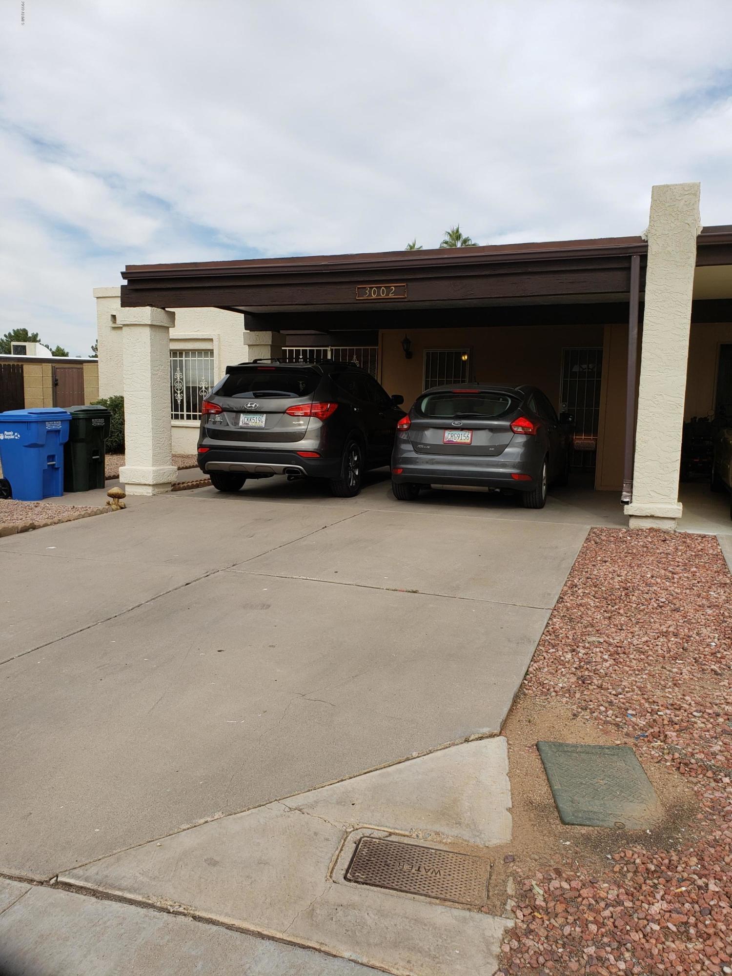 3002 West Redfield Road Phoenix, AZ 85053 - Photo 3 of 49 a view of a cars parking space