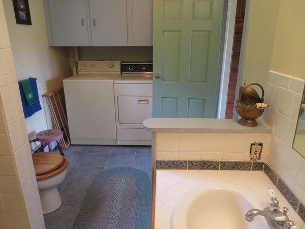 13 West Branch Road Heath, MA 01340 - Photo 11 of 28 a room with a sink and a washer dryer