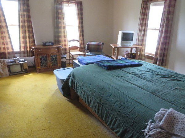 13 West Branch Road Heath, MA 01340 - Photo 17 of 28 a bedroom with a bed and a couch