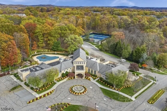 a view of a two chairs in the balcony