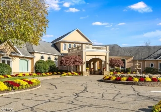 a view of multiple houses with yard