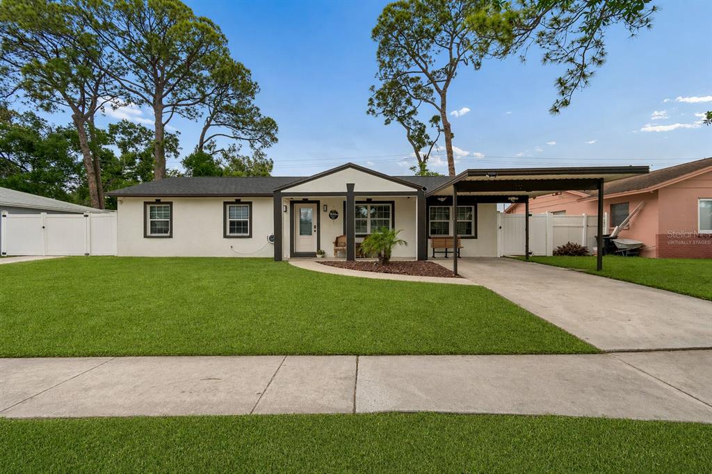 7705 Jackson Springs Road Tampa, FL 33615 - Photo 1 of 39