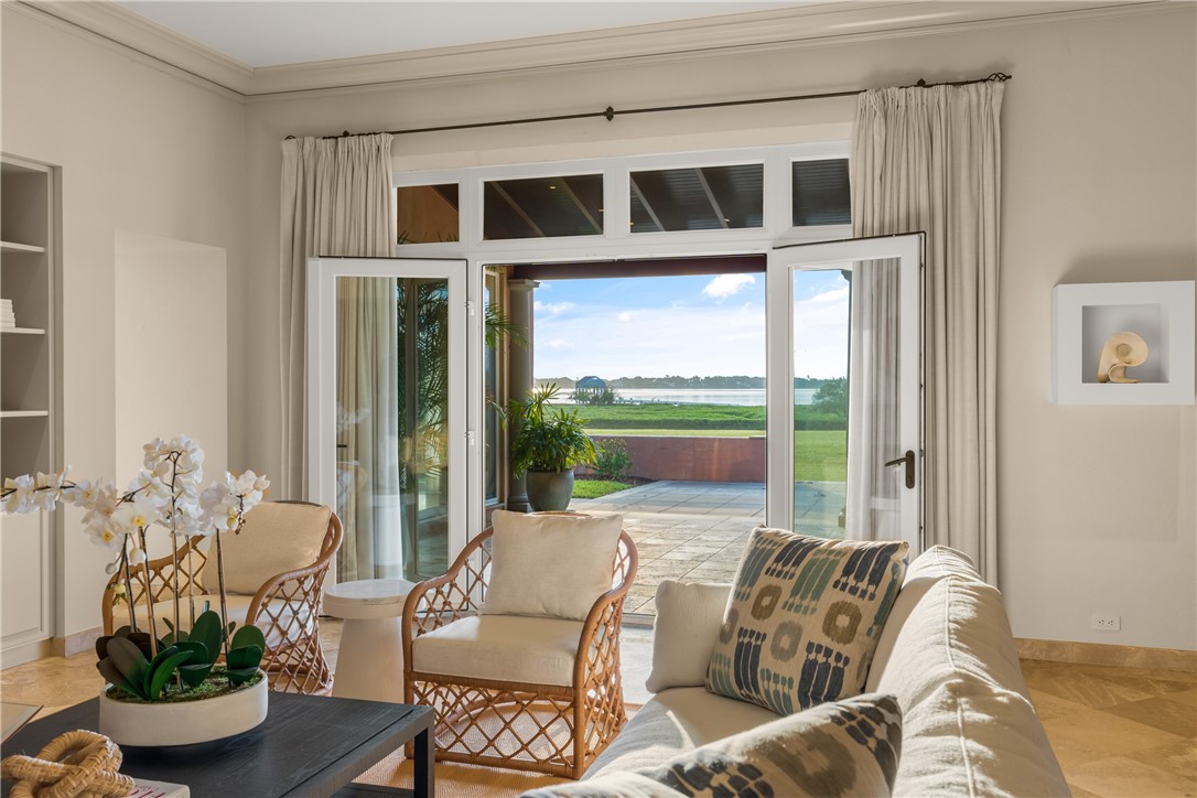 2350 Quay Dock Road Vero Beach, FL 32967 - Photo 15 of 35 a living room with furniture and a potted plant