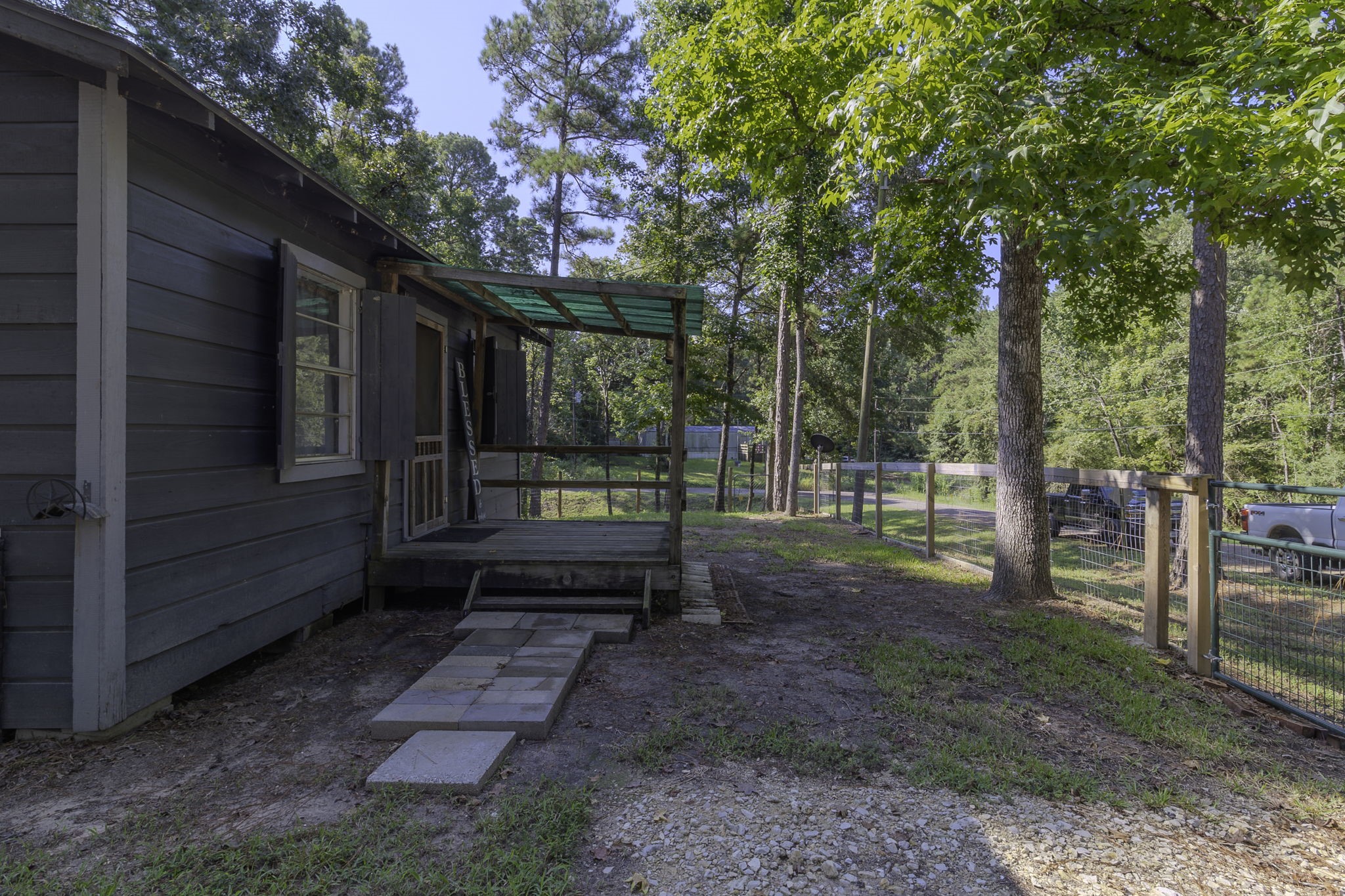 126 Pine Ridge Onalaska, TX 77360 - Photo 13 of 16 a view of a yard with trees