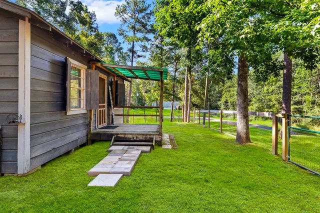 a view of a back yard with a house