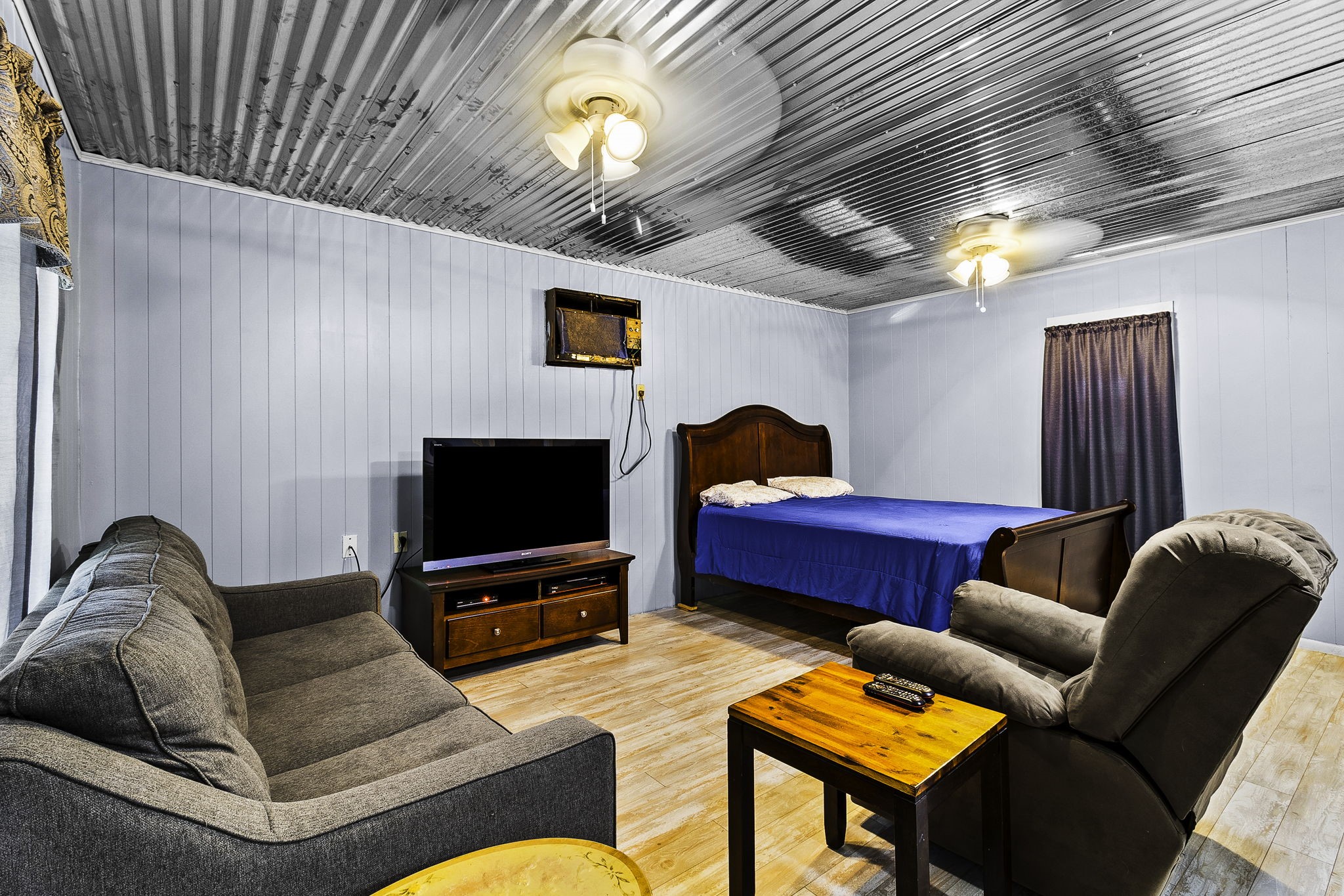 126 Pine Ridge Onalaska, TX 77360 - Photo 9 of 16 a living room with furniture and a flat screen tv