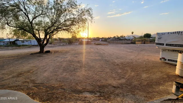 a view of outdoor space with deck and tree