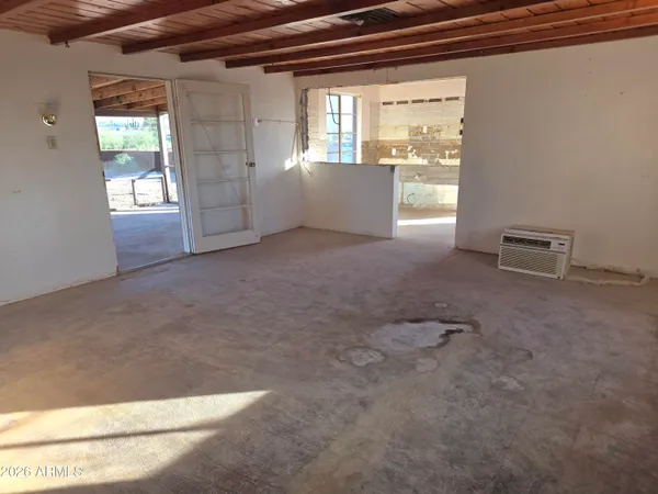 a bed room with a bed and a window