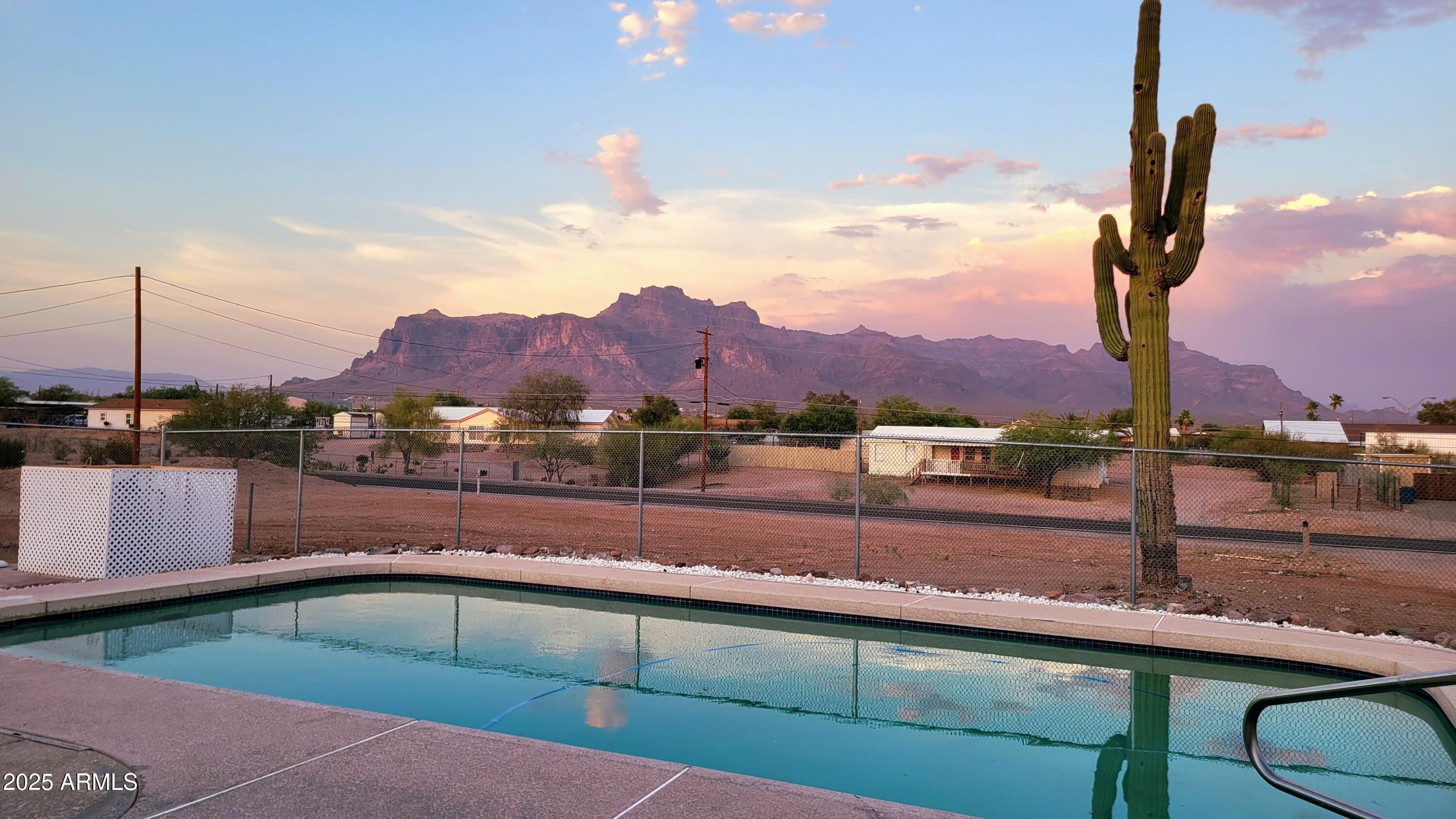 522 South Cortez Road Apache Junction, AZ 85119 - Photo 24 of 48 a view of a terrace with a table and chairs