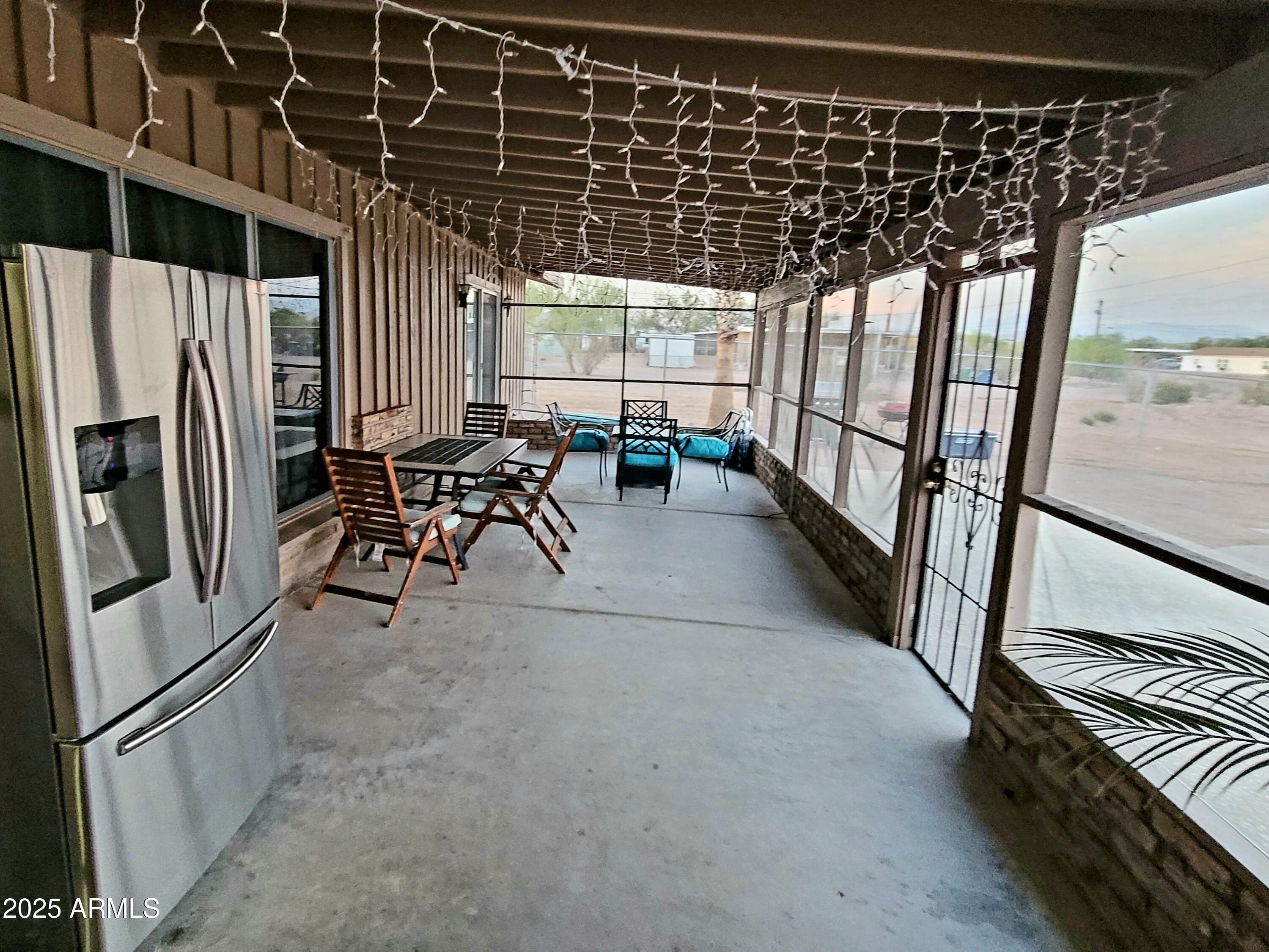 522 South Cortez Road Apache Junction, AZ 85119 - Photo 27 of 48 a lobby with furniture and floor to ceiling window
