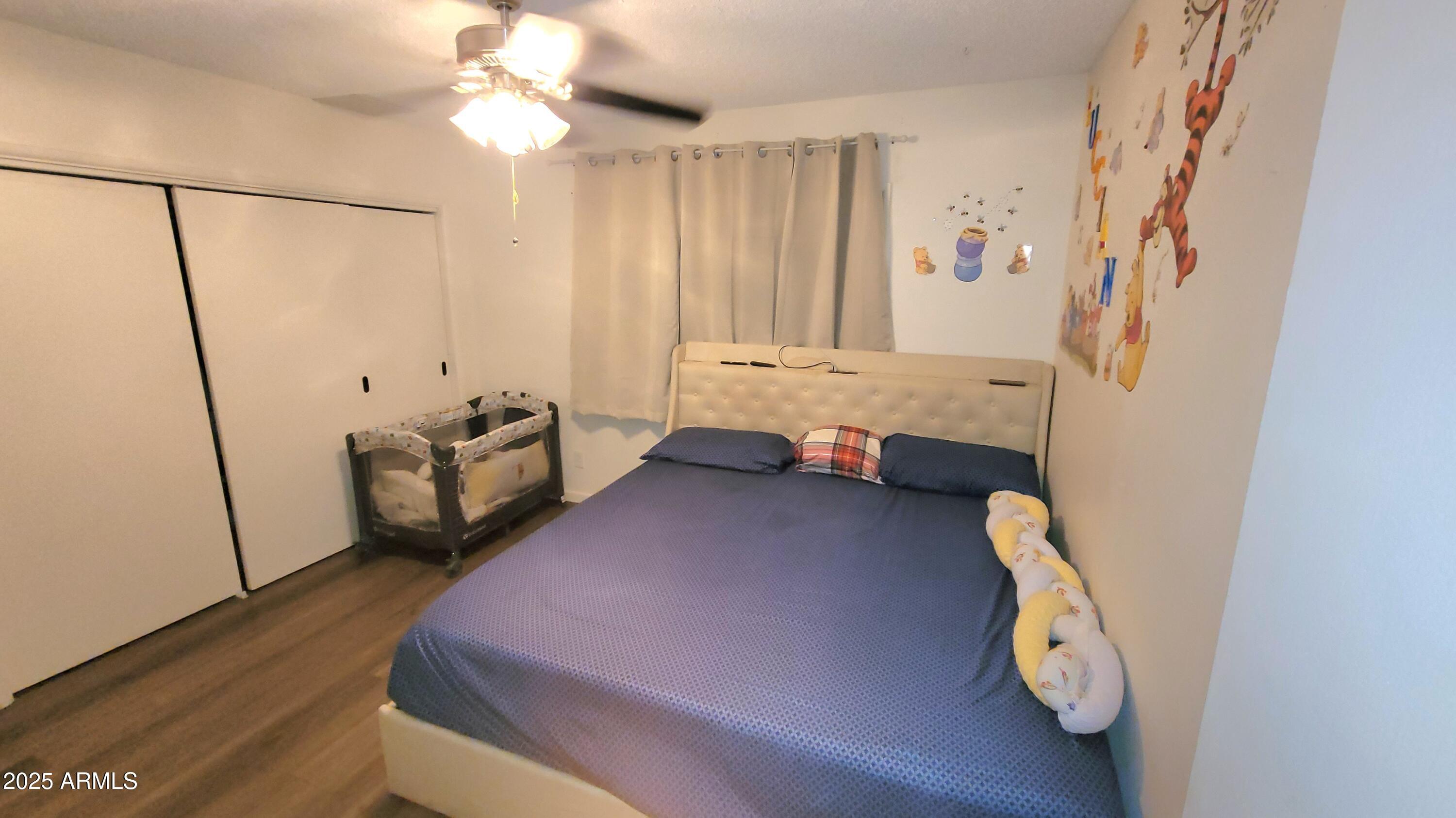 522 South Cortez Road Apache Junction, AZ 85119 - Photo 38 of 48 a bed room with a bed and a window