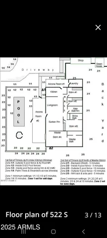 a view of a kitchen with stainless steel appliances