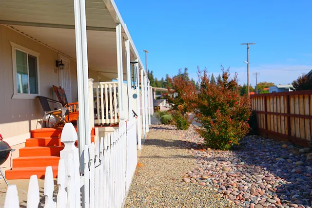 a view of a pathway with a patio