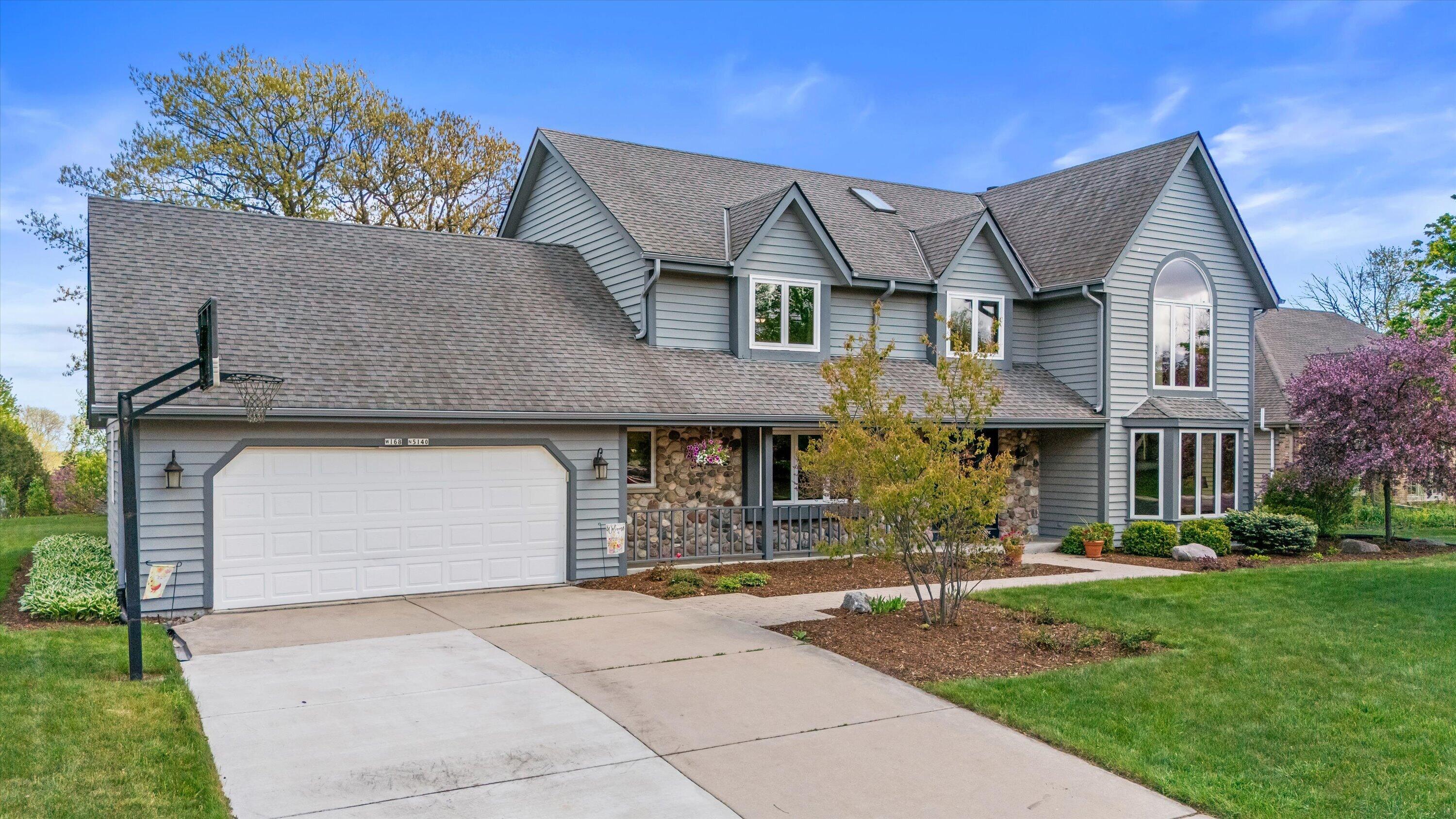 W168N5140 Stonefield Road Menomonee Falls, WI 53051 - Photo 2 of 49 Stunning curb appeal