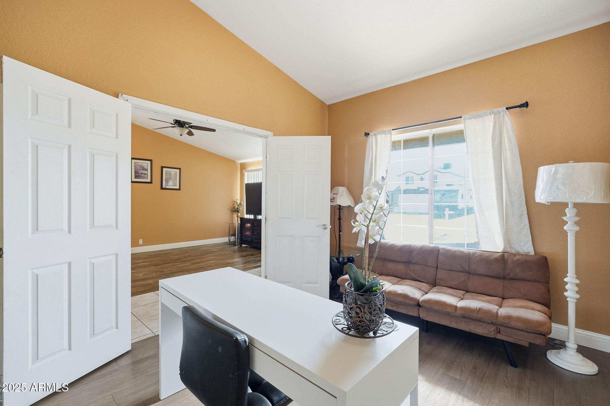8730 West Ocotillo Road Glendale, AZ 85305 - Photo 11 of 58 a living room with furniture and a window